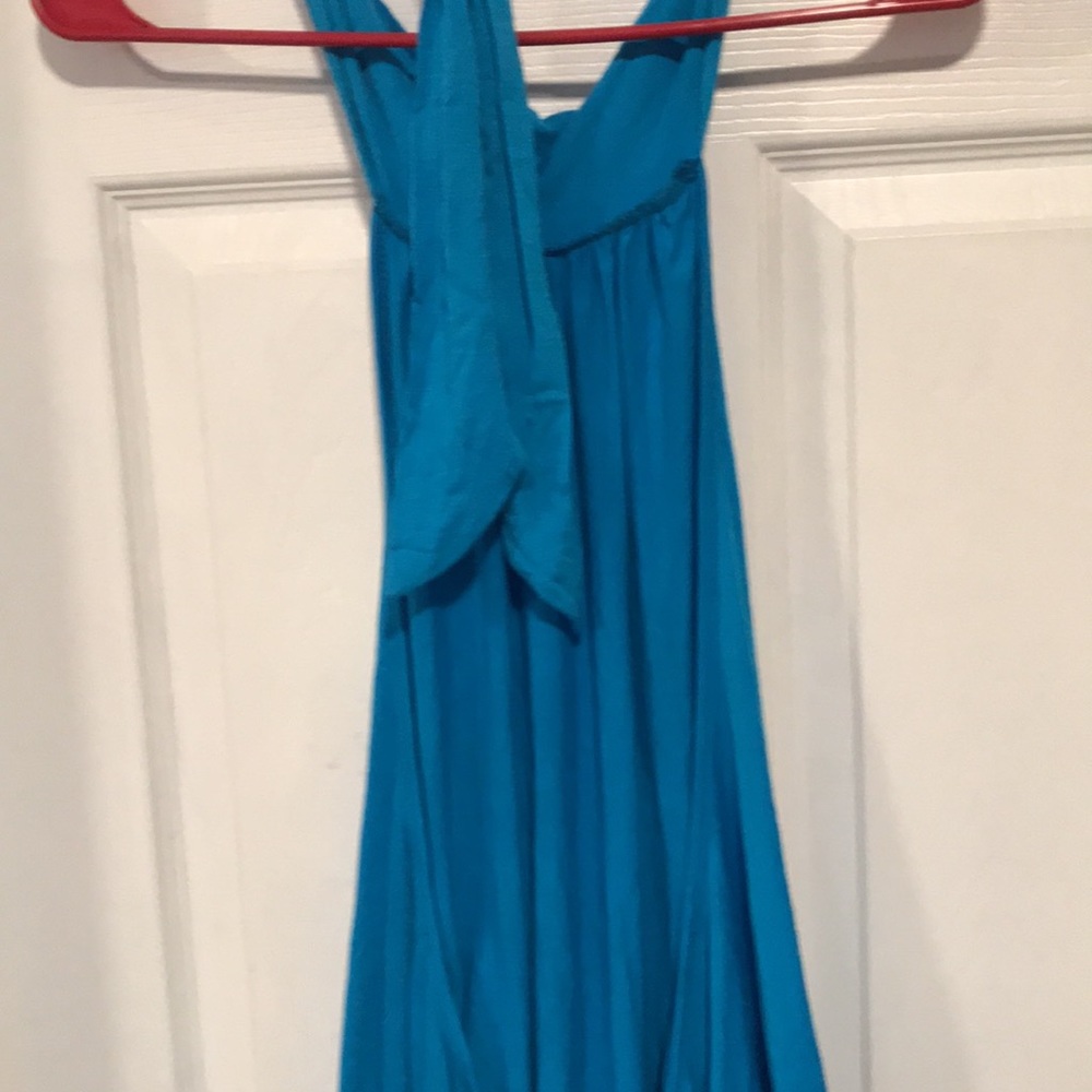 Backless top with neck jewelry - Picture 7 of 8